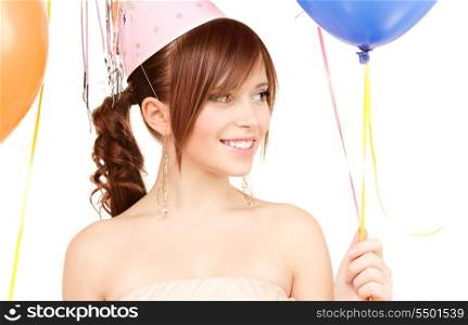 happy teenage party girl with balloons