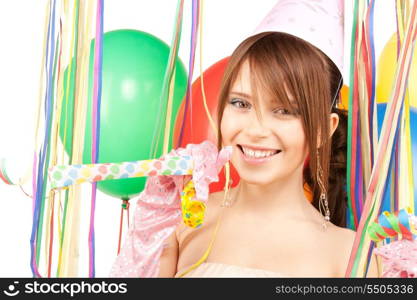 happy teenage party girl with balloons over white