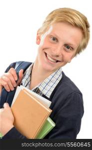 Happy teenage student boy holding books against white background