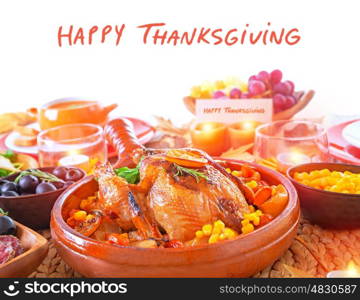 Happy Thanksgiving day, festive table setting with text space, tasty oven baked turkey and vegetables for holiday dinner, decorated with nice little candle