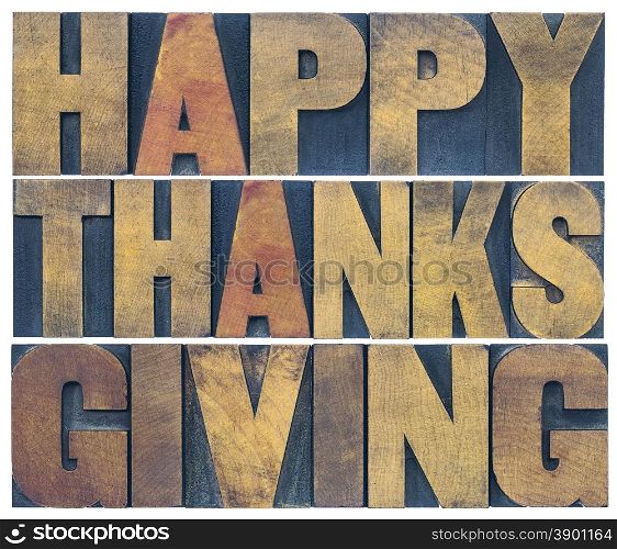 Happy Thanksgiving greeting card or poster - isolated text in vintage letterpress wood type blocks scaled to a rectangle shape