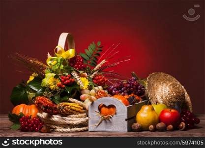 Happy Thanksgiving still life. Fruits, nuts and vegetables, fall crop on the table