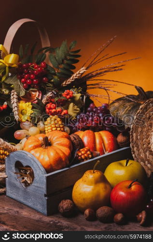 Happy Thanksgiving still life. Fruits, nuts and vegetables, fall crop on the table