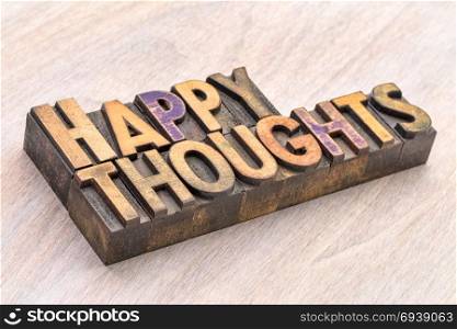 Happy thoughts word abstract in vintage letterpress wood type