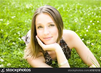 Happy Time! Sexy Woman Laying On The Grass.