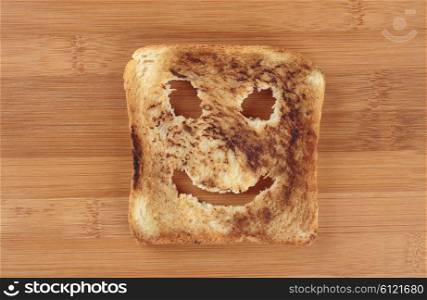 Happy toast on a wooden cutting board
