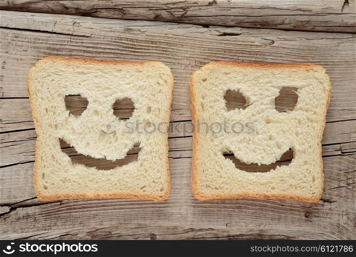 Happy toast on an old wooden board