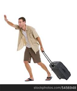 Happy tourist with wheels bag hurry to airplane