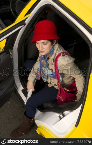 Happy Traveler Female Gets Out of Taxi Cab Downtown