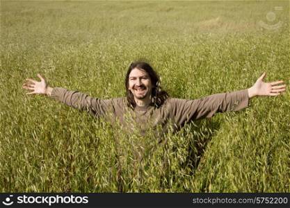 happy ugly casual man having fun at a field