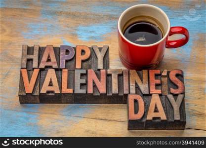 Happy Valentine&rsquo;s Day in vintage letterpress wood type blocks with a cup of coffee
