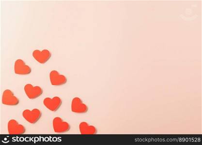Happy Valentine’s day concept. Symbol of love paper art with copy space for text, handmade red paper hearts shape cutting pastel pink background, Mother’s Day