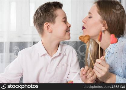 Happy Valentines Day, Mother day or Woman 8 march Day. Young boy spend time with his mum and celebrate it