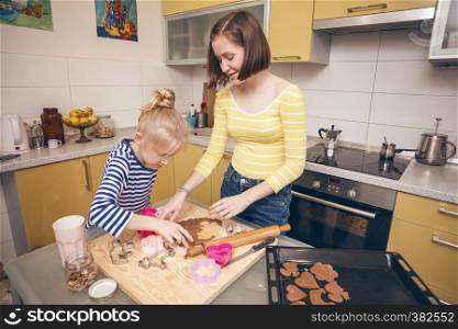 happy weekend - Sister girls cook a Linzer Cookies in the kitchen