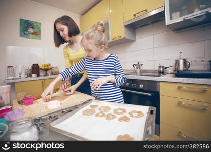 happy weekend - Sister girls cook a Linzer Cookies in the kitchen