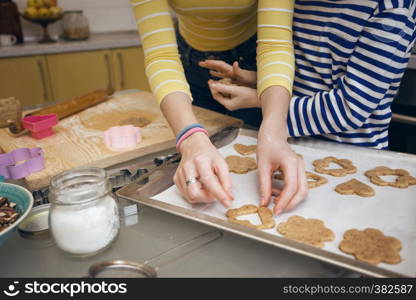 happy weekend - Sister girls cook a Linzer Cookies in the kitchen