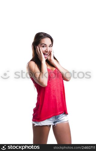 Happy woman astonished with something, isolated over white background