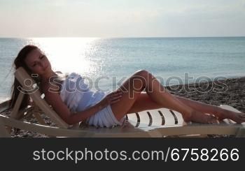happy woman at the beach enjoying vacation