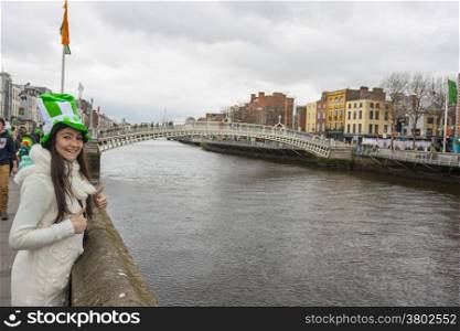 Happy woman at the River Liffey in Dublin
