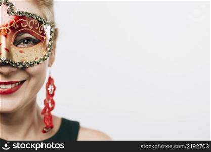 happy woman bright red carnival mask