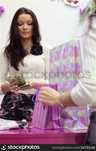 happy woman buy clothes in shop