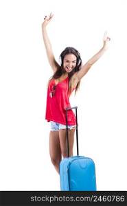 Happy woman going on vacation with a her suitcase
