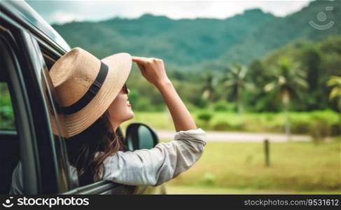 Happy woman hand holding hat outside open window car