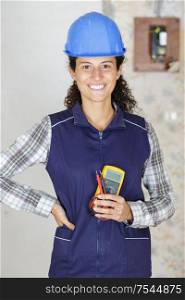 happy woman hand metering socket voltage