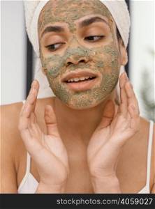 happy woman having homemade mask her face 2