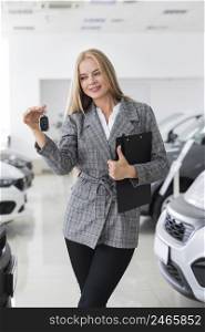 happy woman holding car keys