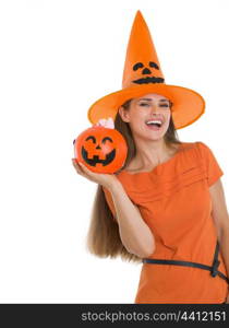 Happy woman holding Halloween bucket