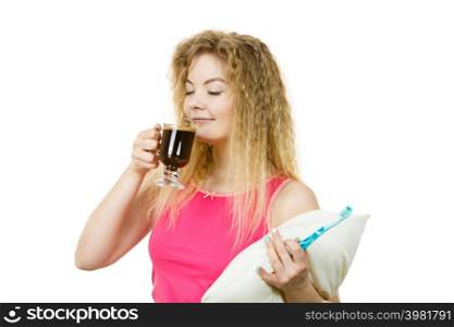 Happy woman holding toothbrush and coffee going to brush her teeth after hot drink.. Happy woman holding toothbrush and coffee