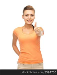 happy woman in blank color t-shirt showing thumbs up