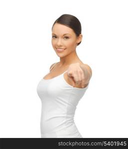 happy woman in blank white t-shirt pointing at you