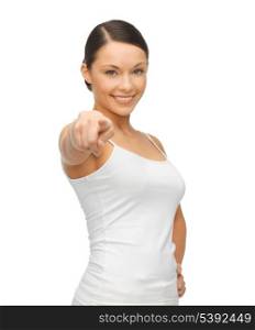 happy woman in blank white t-shirt pointing her finger