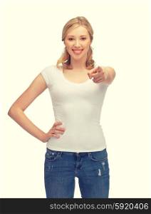 happy woman in blank white t-shirt pointing her finger. woman in blank white t-shirt pointing her finger