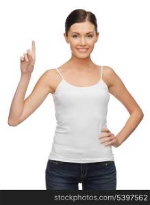 happy woman in blank white t-shirt with finger up