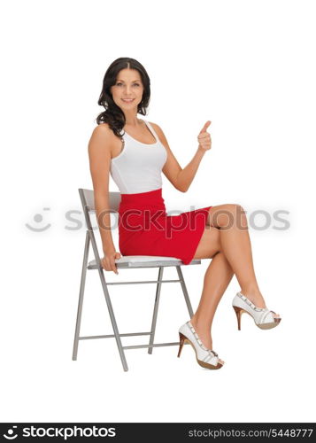 happy woman in blank white t-shirt with thumbs up