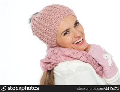 Happy woman in knit scarf, hat and mittens