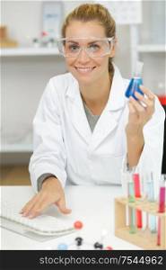 happy woman in lab
