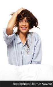 happy woman in pajamas playing with her hair. happy woman in pajamas playing with her hair on white background
