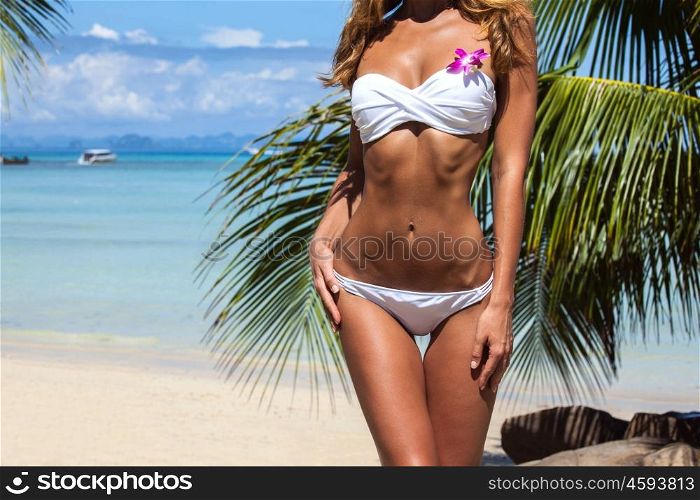Happy woman on beach. Happy woman with on beach with palms in Thailand