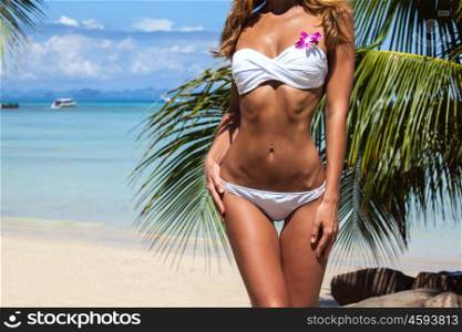 Happy woman on beach. Happy woman with on beach with palms in Thailand