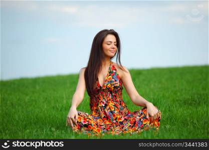 happy woman on green grass