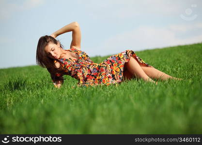 happy woman on green grass