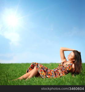 happy woman on green grass