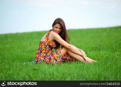 happy woman on green grass