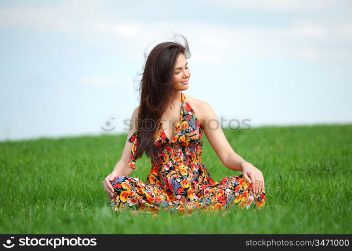 happy woman on green grass