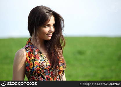 happy woman on green grass