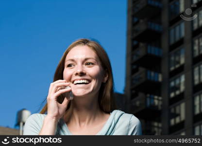 Happy woman on mobile phone